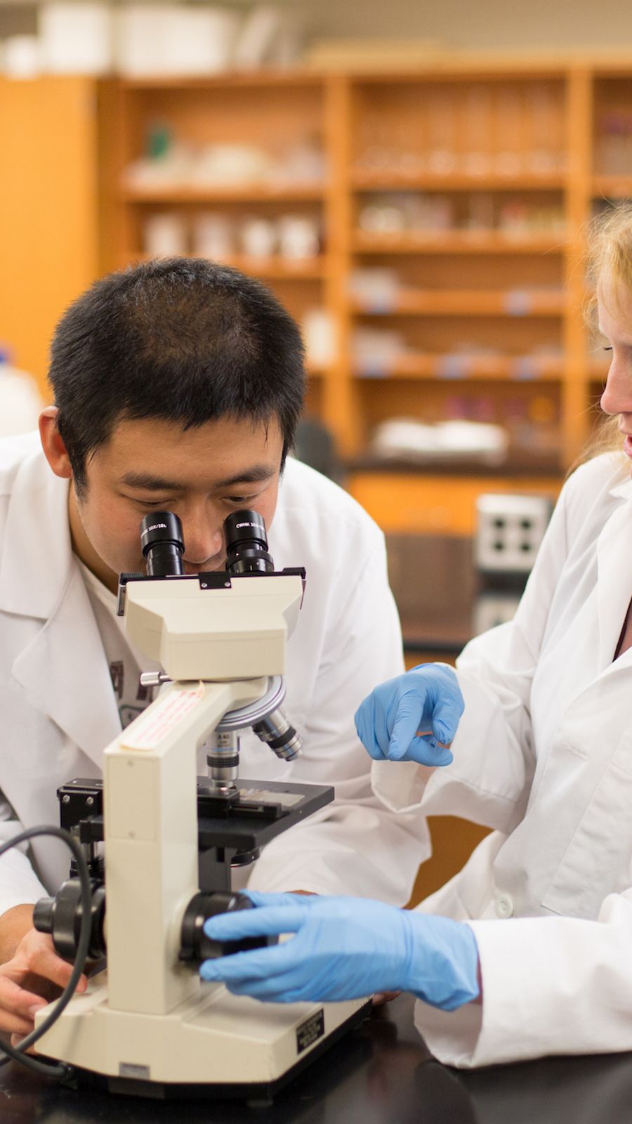 Biology professor with student