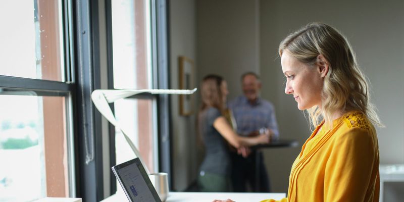 Woman working at a computer