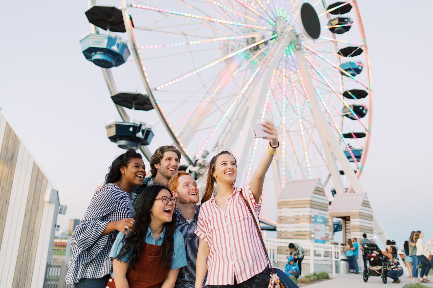 OC students taking a selfie in front of the Wheeler Ferris Wheel