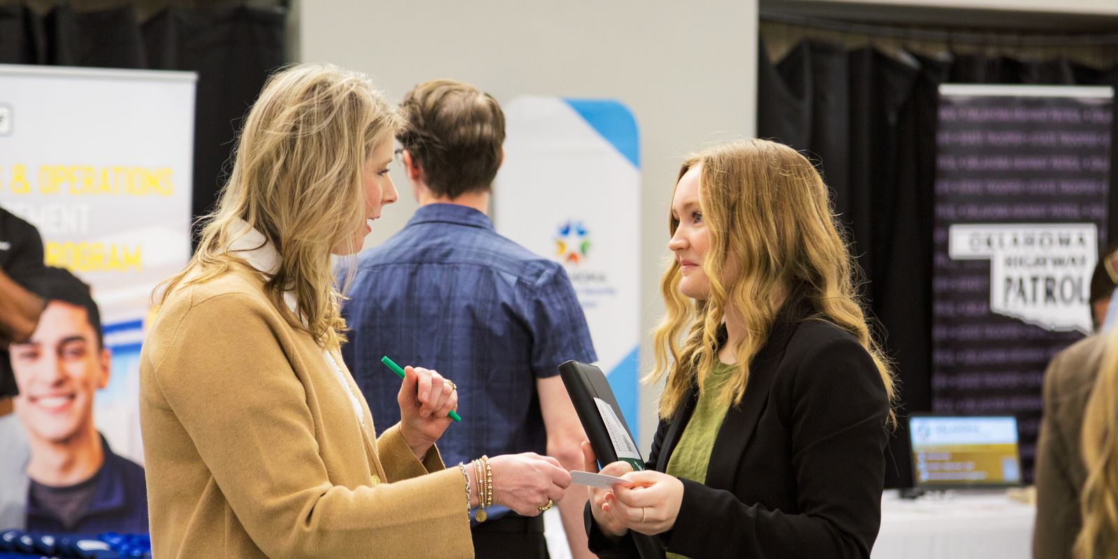 People talking at a career fair