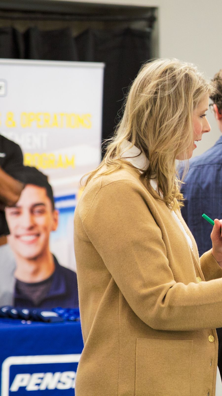 People talking at a career fair