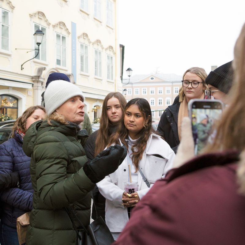 Tour Guide presenting on Austria to OC Students